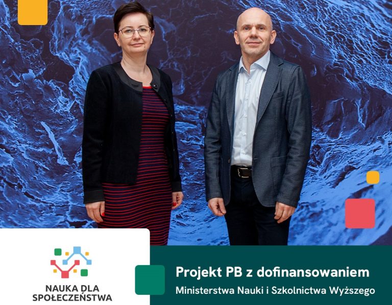 Dwoje ludzi pozuje do zdjęcia.